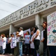 El Gobierno promulgó las leyes de financiamiento universitario y pediátrico, pero postergó su aplicación
